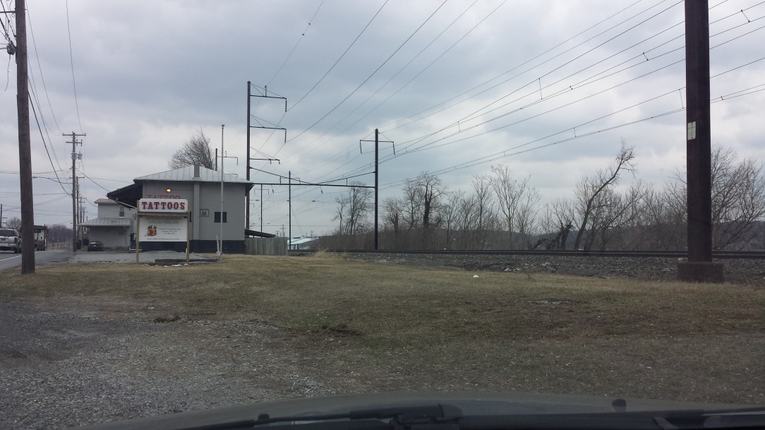So this I think is actually cool. In Paradise there is a tattoo parlor and bar where it appears an old train station once was. 
