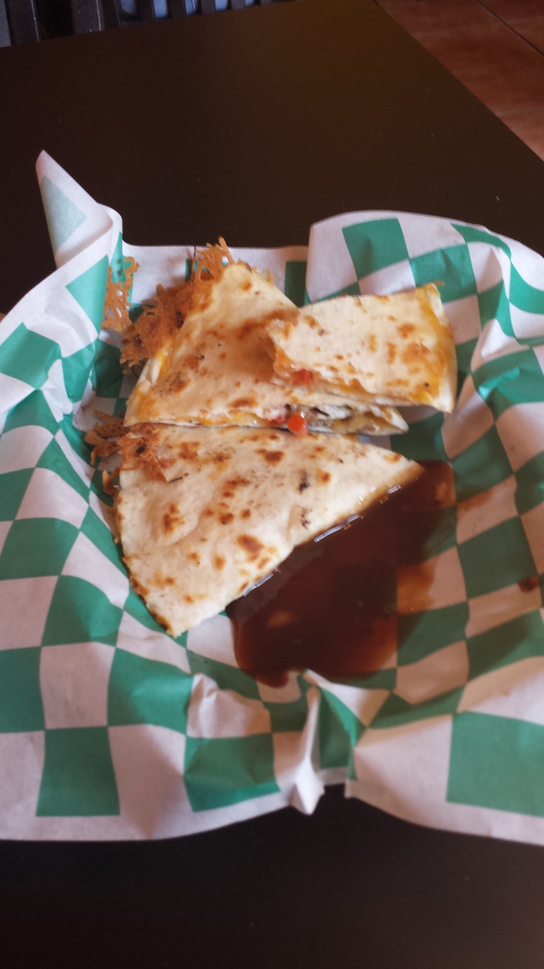 I tried to take a nice picture but couldn't help taking a few bites and smothering it with BBQ sauce as soon as I got my quesadilla.