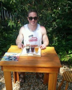 Happy to be on flat ground...and sitting...and with beer in front of me. 